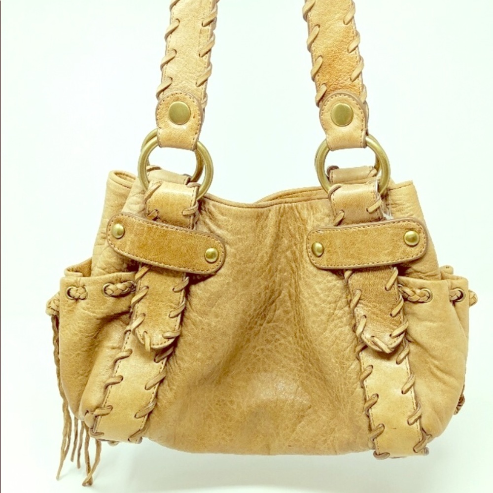 Kooba-handcrafted leather stitched purse